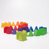An array of Grimm’s Medium Octagon blocks (ships in 2-3 weeks) is artfully arranged in pyramid shapes, sorted by color gradient from green at the front and shifting to blue, purple, red, orange, and yellow toward the back against a plain white background. This vibrant display highlights the playful design and educational appeal of this geometric toy set.