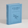 Light blue Scrabble for Juniors Vintage Bookshelf Edition game box shaped like a book, featuring an airplane icon on the cover.