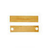 The Huckleberry Grass Whistle set features two rectangular bamboo sticks on a white background—one engraved with "KIKKERLAND," the other designed for whistle sounds with two round holes. Ideal for outdoor hiking adventures.