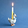 Goose in a party hat candle holder