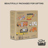 A cardboard box labeled "Emergency Helicopter & Rescue Cars" features colorful illustrations of six wooden toy vehicles, with text saying "Beautifully packaged for gifting," "100% recyclable packaging," and perfect for imaginative play.