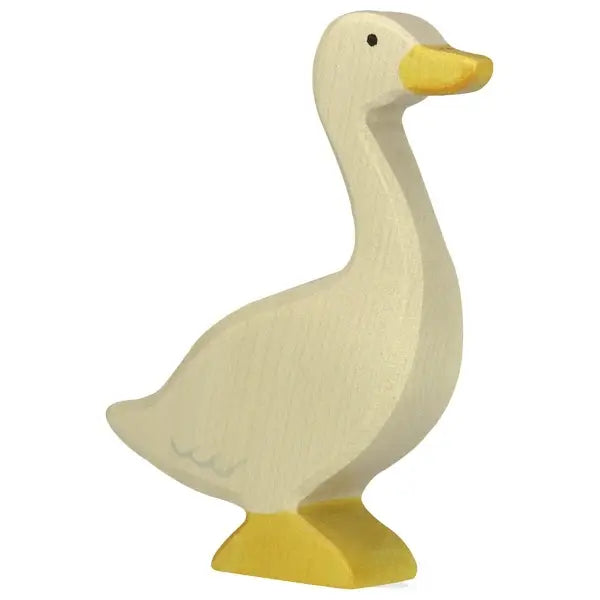 A Holztiger Goose, Standing is upright. Handcrafted from premium wood, this goose boasts a light cream color, with a yellow beak and yellow webbed feet. The design is simple, with minimal detailing to represent the bird's features. Made in Europe, it mirrors the quality of HOLZTIGER figures.