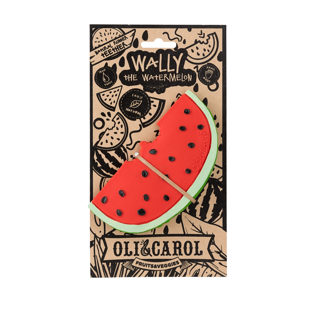 Wally the Watermelon Teether by Oli & Carol is a natural rubber baby teething toy shaped like a bright red watermelon slice with black seeds, featuring playful fruit illustrations and packaged on branded cardboard.