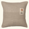The Coral & Tusk Bat Wing Surprise Pillow is a square beige pillow with a red coral tree, anchor patch, and "CORAL & TUSK" on the back. Its linen-like fabric is perfect for pairing with other nature-themed decor like butterfly wings or bat plushies.