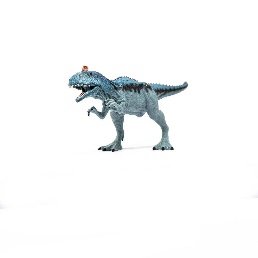 A Schleich Cryolophosaurus Dinosaur Toy with Movable Jaw stands on a white background.