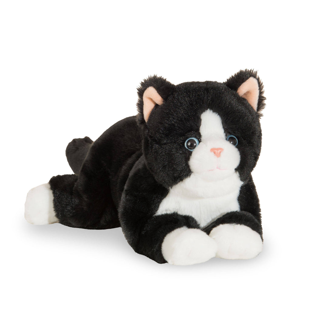 The Teddy Hermann Black Cat Stuffed Animal from the Hermann Teddy Collection features plush black fur with white paws, chest, and face. Its round, expressive eyes and small pink ears add to its charm. This cuddly toy is designed in a lying down position with its front paws stretched forward.