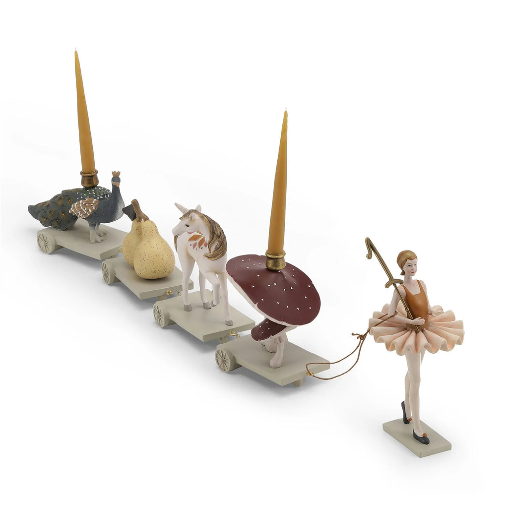 polyresin train of animals and figurines holding candles and numbers