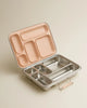 The Haps Nordic - Stainless Steel Lunch Box - Multi-Compartment (Blush) features several compartments and a light pink blush lid, shown open on a neutral background—making it the ideal meal prep container for organized lunches.