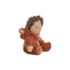 A plush doll with curly brown hair, blue eyes, and wearing a fuzzy, orange "Olli Ella | Dinky Dinkums Forest Friends - Bobby Bear" suit, sitting against a black background with white horizontal lines.