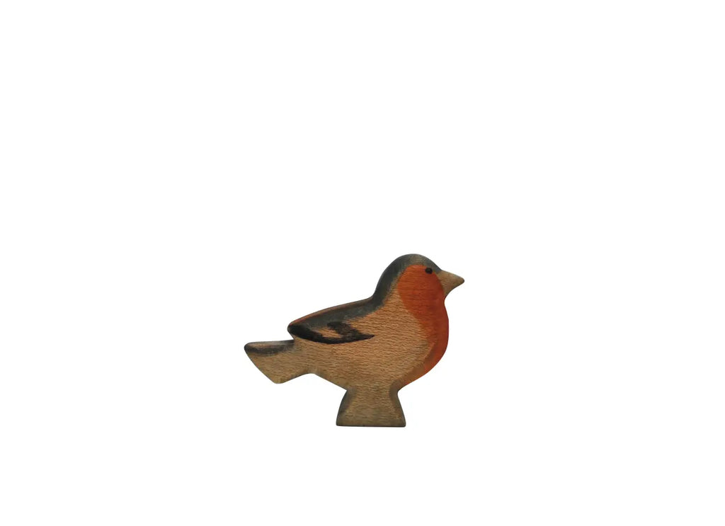 The Handmade Holzwald Finch Bird is a small wooden figurine featuring a red breast and brown wings, standing upright against a white background—a charming example of sustainable toy design.
