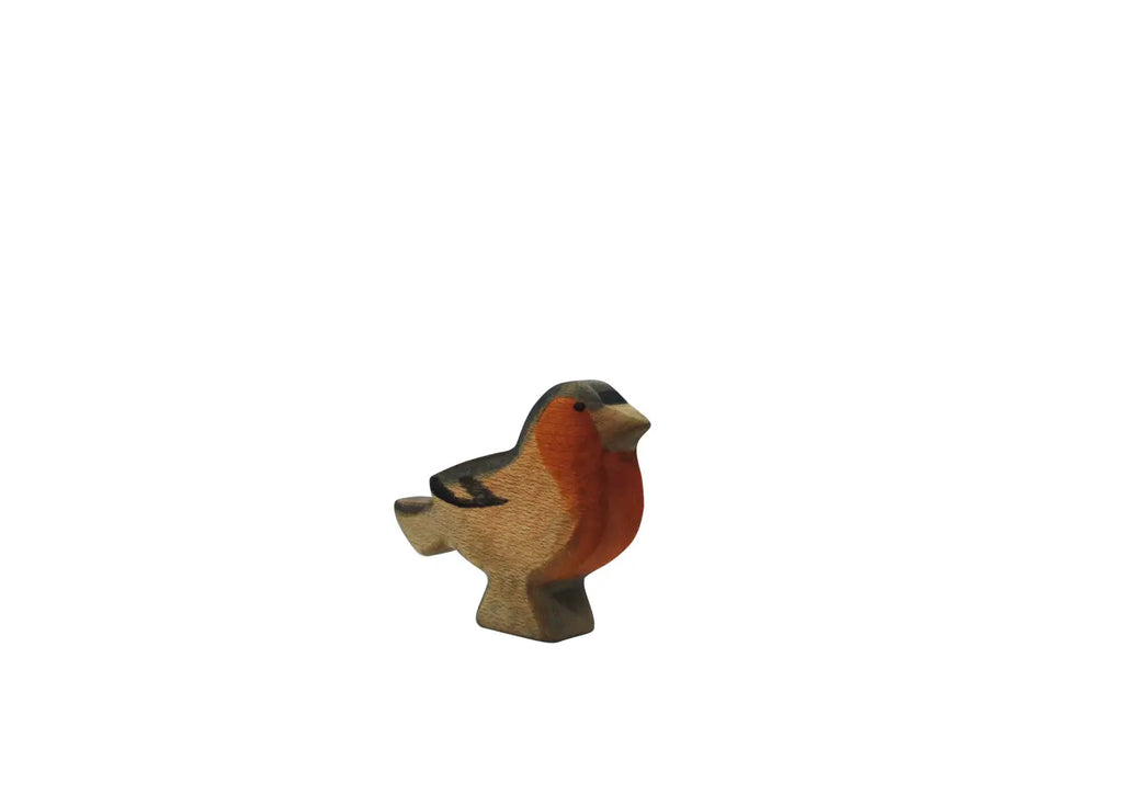 The Handmade Holzwald Finch Bird is a small, wooden figurine with a red-orange chest and brown wings, featuring a simple design—ideal for those who appreciate sustainable toys.