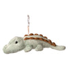 Introducing the Bukowski - Maximus Alligator Bag Charm: a light green plush alligator keychain featuring brown ridges along its back, lying flat with a small chain attached to the top—perfect as a playful backpack accessory or a fun addition to your keyring.