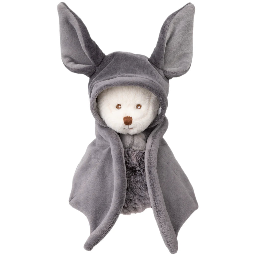 The Bukowski - Ziggy Bat is a white teddy bear dressed in a soft gray hooded cape with large, pointed ears, resembling a bat or fox. This cute Halloween plush is shown against a white background.