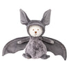 Bukowski - Ziggy Bat is a plush stuffed animal with a white face, brown nose, and soft gray Halloween bat costume featuring large ears, wings, and a fluffy body. It sits upright against a white background.