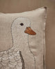 The Coral & Tusk Mama Duck Pocket Pillow is a beige pillow with an embroidered white duck in profile. Add removable felt ducklings for a playful, charming touch to your decor.
