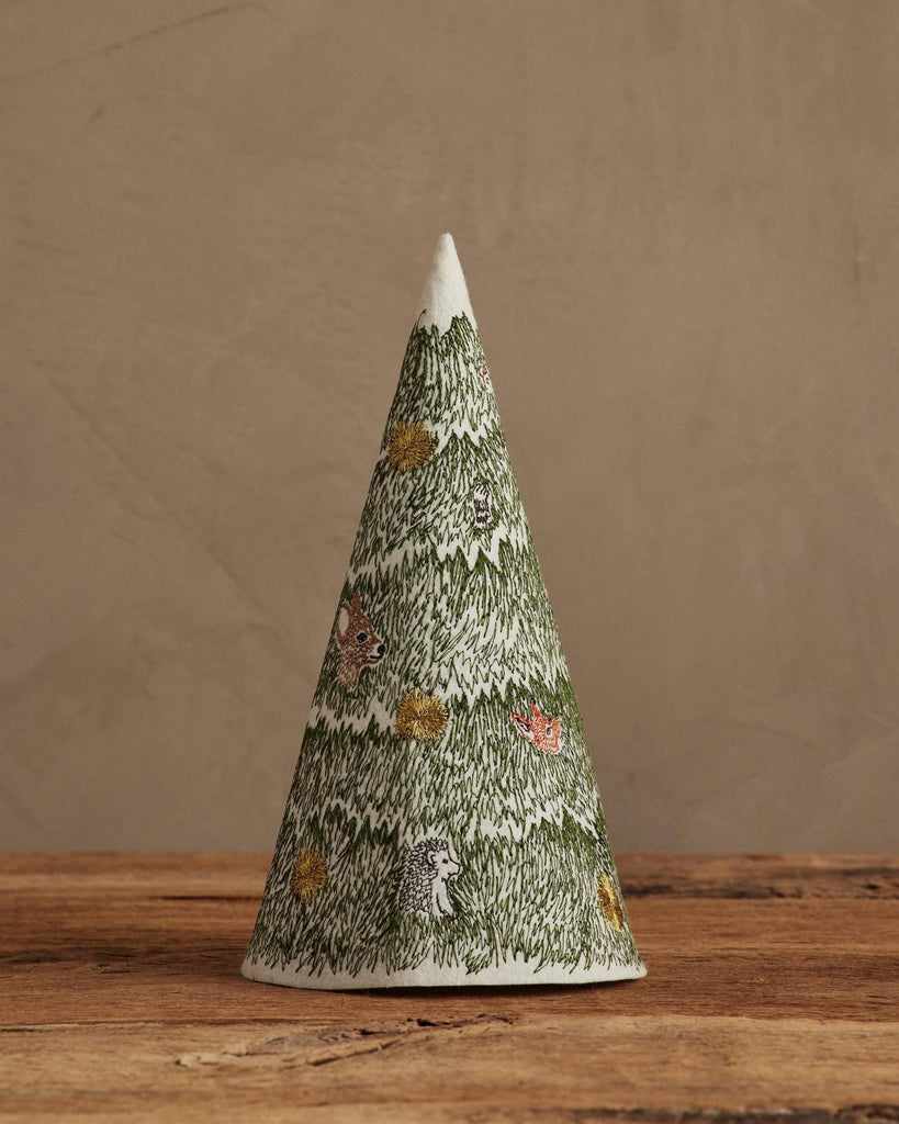 Coral & Tusk Peek a Tree Tree featuring a cone-shaped felt design with embroidered woodland animals and gold starbursts on a grassy pattern.