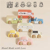 A set of Vintage Toy Cars in vibrant colors on a neutral background, with icons above for creativity, coordination, imagination, social skills, and dexterity. Text says "Hand Made with Love" and "Learn Discover Play.