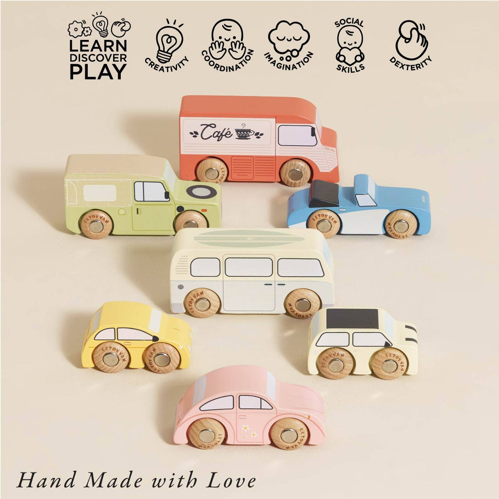 A set of Vintage Toy Cars in vibrant colors on a neutral background, with icons above for creativity, coordination, imagination, social skills, and dexterity. Text says "Hand Made with Love" and "Learn Discover Play.