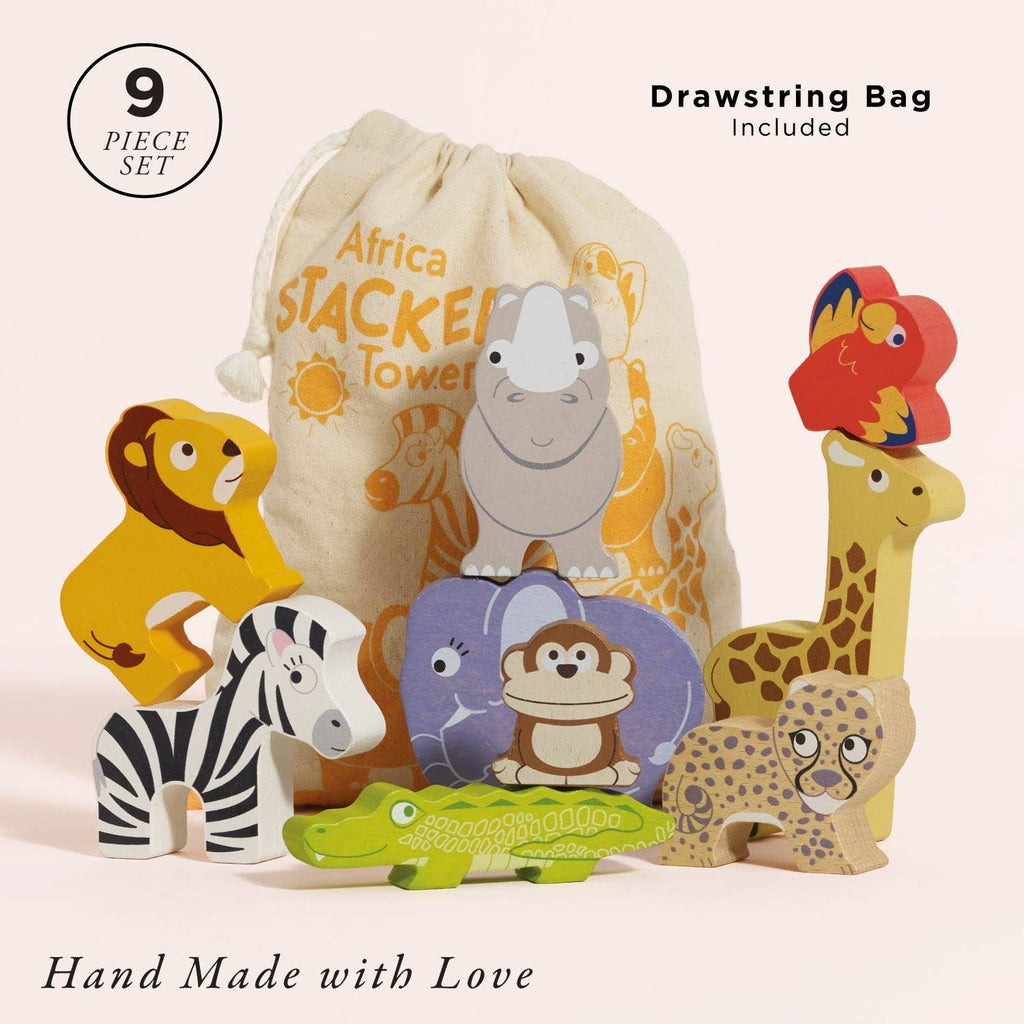 Nine colorful wooden animal figures, including a lion, zebra, crocodile, and giraffe, are displayed in front of the Africa Stacking Animals & Bag. This sustainable toy promotes fine motor skills and features handmade quality.