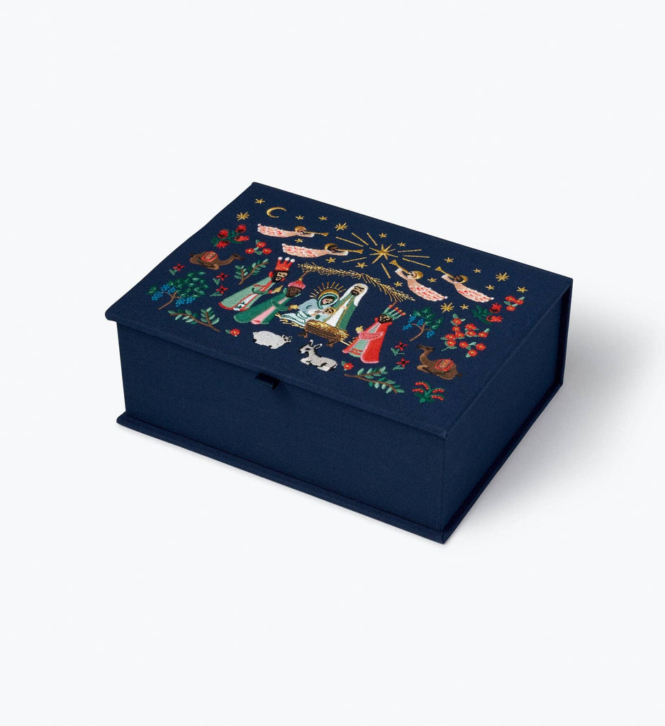 A navy blue rectangular Nativity Large Embroidered Keepsake Box featuring a nativity scene on the lid, with the Holy Family, angels, and animals under a starry sky.