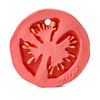Renato the Tomato is a round, flat teething toy made from natural rubber, colored red and pink with yellow seed details, a small edge hole, and “Oli & Carol” embossed. It's an eco-friendly choice for babies.