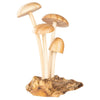 The Small Wooden Natural Mushroom Trio features three wooden mushrooms with light brown caps and long stems, intricately attached to a textured brown wooden base that mimics mushrooms sprouting from a log. This decorative figurine is perfect as driftwood decor, bringing natural charm to any space.