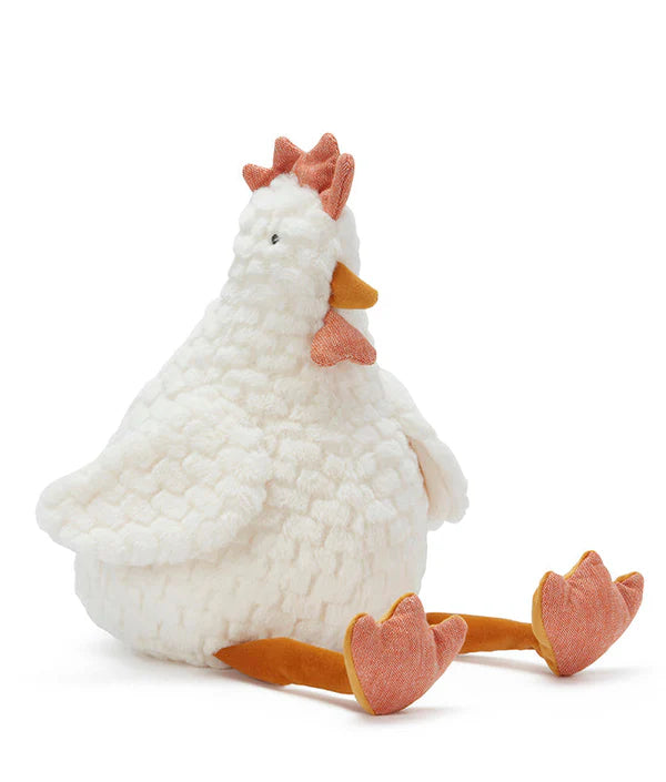 Meet the Charlie the Chicken Stuffed Animal, a plush toy shaped like a chicken with a textured white body. It features pink fabric accents on its comb, wattle, and beak, along with yellow-orange legs and feet. This adorable stuffed animal sits charmingly with its long legs stretched out in front.