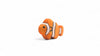 The Handmade Holzwald Clownfish, a small orange and white wooden toy with black stripes, is displayed on a white background, highlighting the charm of Holzwald toys.