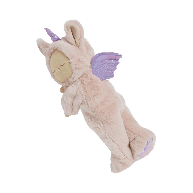 Introducing the Olli Ella Cozy Dinkum Doll Unicorn - Sugarpie, a plush toy with soft blush fur and a lavender horn. Its shimmering wings complement its serene look, complete with closed eyes and small ears on its hood.