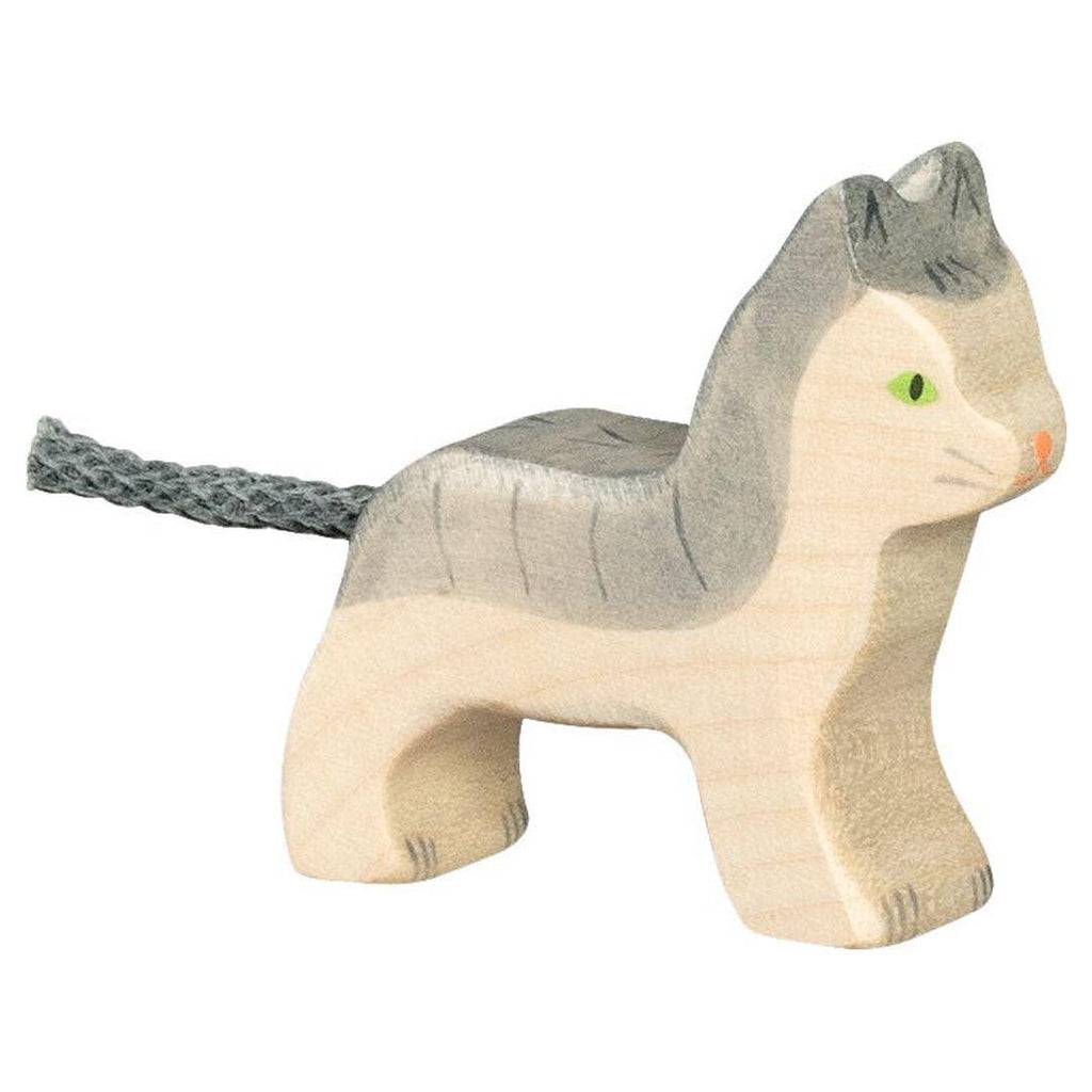 The Holztiger Cat, Small is a handcrafted wooden cat figurine with painted gray and white details, green eyes, and a gray yarn tail—made in Europe in the classic HOLZTIGER style.