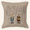 The Coral & Tusk Aspen Skiers Pillow showcases charming embroidered rabbit and bear skiers in winter outfits among trees on a beige background, making it an ideal addition to your cozy seasonal decor.