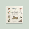 Our Big Book of Animals (Board Book) features illustrated animals like a parrot, tiger, shark, walrus, sheep, guinea pig, and bird. Its subtitle introduces animal vocabulary and foundational words to support language development for babies.