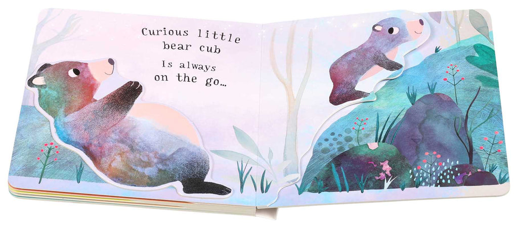 The interactive board book "I Love You So" by Patricia Hegarty features a curious bear cub, shown lying on its back and climbing a blue hill—perfect for snuggling up and reading together.