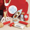 The Pretend Play Vintage Doctor Set includes a wooden syringe, scissors, medicine bottles, stethoscope, and a red medical bag with a blue cross—ideal for kids' imaginative role play and learning about healthcare.