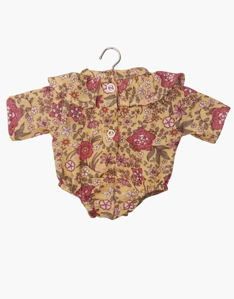 Minikane 13″ Doll Clothing | Colette Romper in Cotton Gauze - Autumn Ball, a yellow floral print short-sleeve romper with a ruffled collar and two white back buttons, designed for 13 to 14-inch dolls.