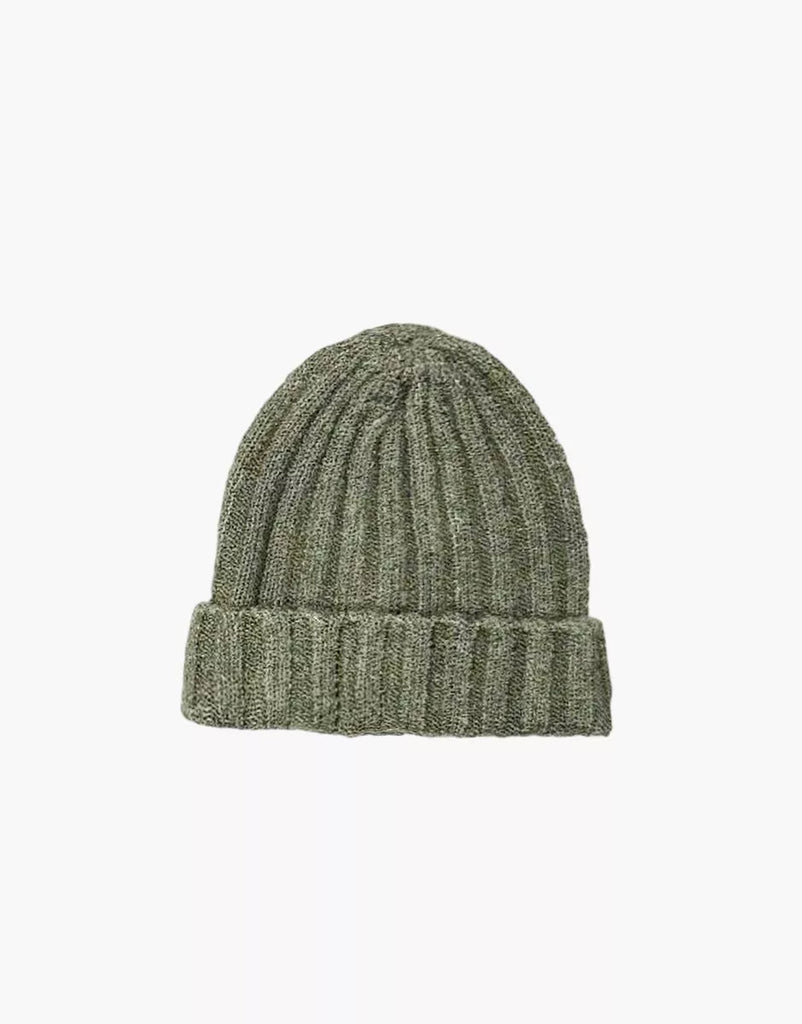 The Minikane Doll Accessories Barry Knit Beanie in green, featuring a folded brim and wool knit, is shown against a plain white background.