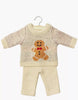 The Minikane 13" Doll Clothing Christmas Gingerbread Two-Piece Knit Set includes a cream-colored long-sleeve sweater with a gingerbread man and matching pants—an ideal festive outfit for Minikane dolls or similar 13-inch doll collections.