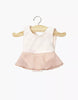 The Minikane 13" Doll Clothing | Ludmila Ruffled Leotard in Lycra and Chiffon - Nude Pink is displayed on a wooden hanger against a plain white background, perfect for Minikane Gordis or other 13-inch dolls.