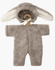The Minikane 13" Doll Clothing | Bunny Costume is a soft gray furry onesie with a hood featuring white and gray bunny ears, perfect for 13 inch dolls like Minikane, shown on a hanger against a white background.