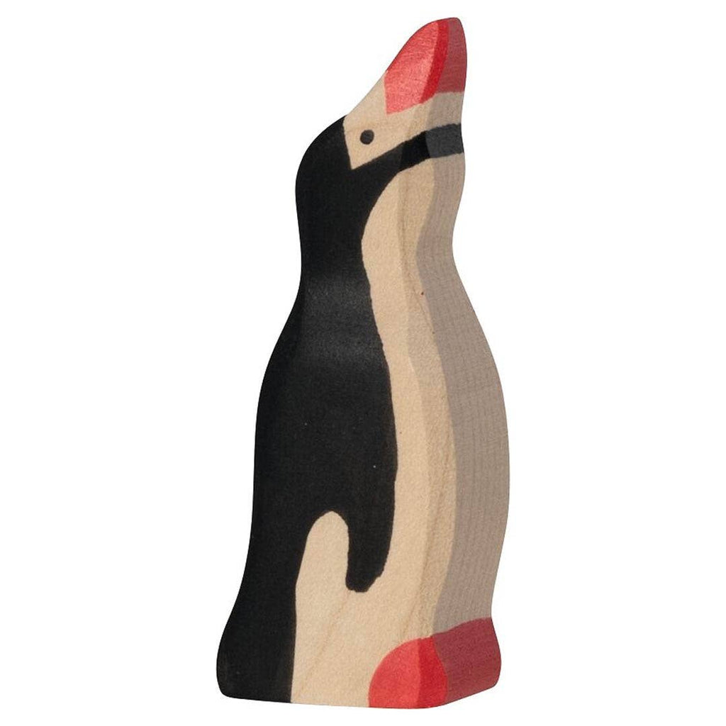 The Holztiger Penguin, Small, Head Raised is a handcrafted wooden figurine made in Europe and painted with black, white, and red details. It stands upright with its head raised, making it a charming addition to any HOLZTIGER figures collection.