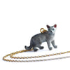 Grey Cat Necklace, hand painted and attached to a 24k gold plated chain, set against a plain white background. The cat features subtle facial details and light blue tint.