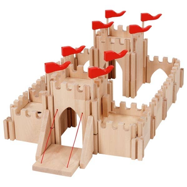 The Holztiger Knight's castle is a handcrafted European wooden playset featuring battlements, arched entrances, a drawbridge, and red flags. Its interlocking pieces form sturdy walls and towers in a rectangular layout.