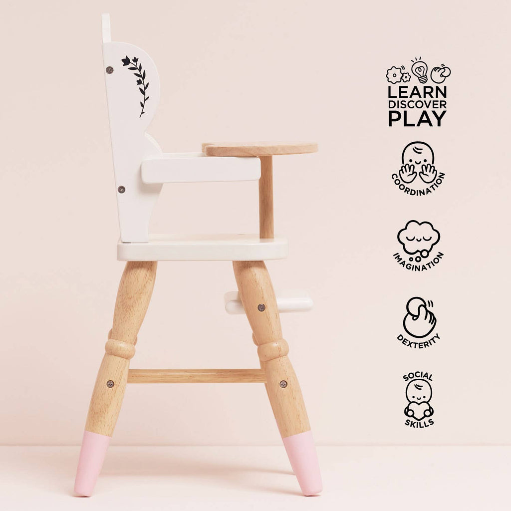 The Dolls Wooden High Chair features white panels and pink-tipped legs. Icons highlight coordination, imagination, dexterity, social skills, and "Learn Discover Play"—making it an ideal pretend play toy for kids.