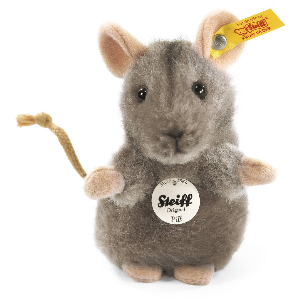 The Steiff Piff Mouse Plush Toy, 4 Inches, features soft grey fur with pink ears and feet, a brown tail, black eyes, a Steiff tag in its ear, and an Original badge on its chest—a charming addition to any collection.