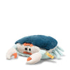 The Steiff Curby Crab Plush Stuffed Toy (9 inches) is shaped like a crab with a dark blue shell, light blue legs and claws, orange accents, expressive eyes, a small orange mouth, and a yellow tag on one claw.