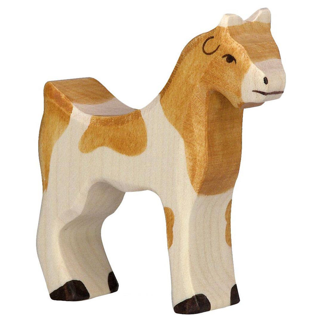 A handcrafted wooden Holztiger Goat with a light brown and cream-colored body, small painted eyes, and dark brown hooves. This figure features simple carved details, a smooth polished finish, and is made in Europe.