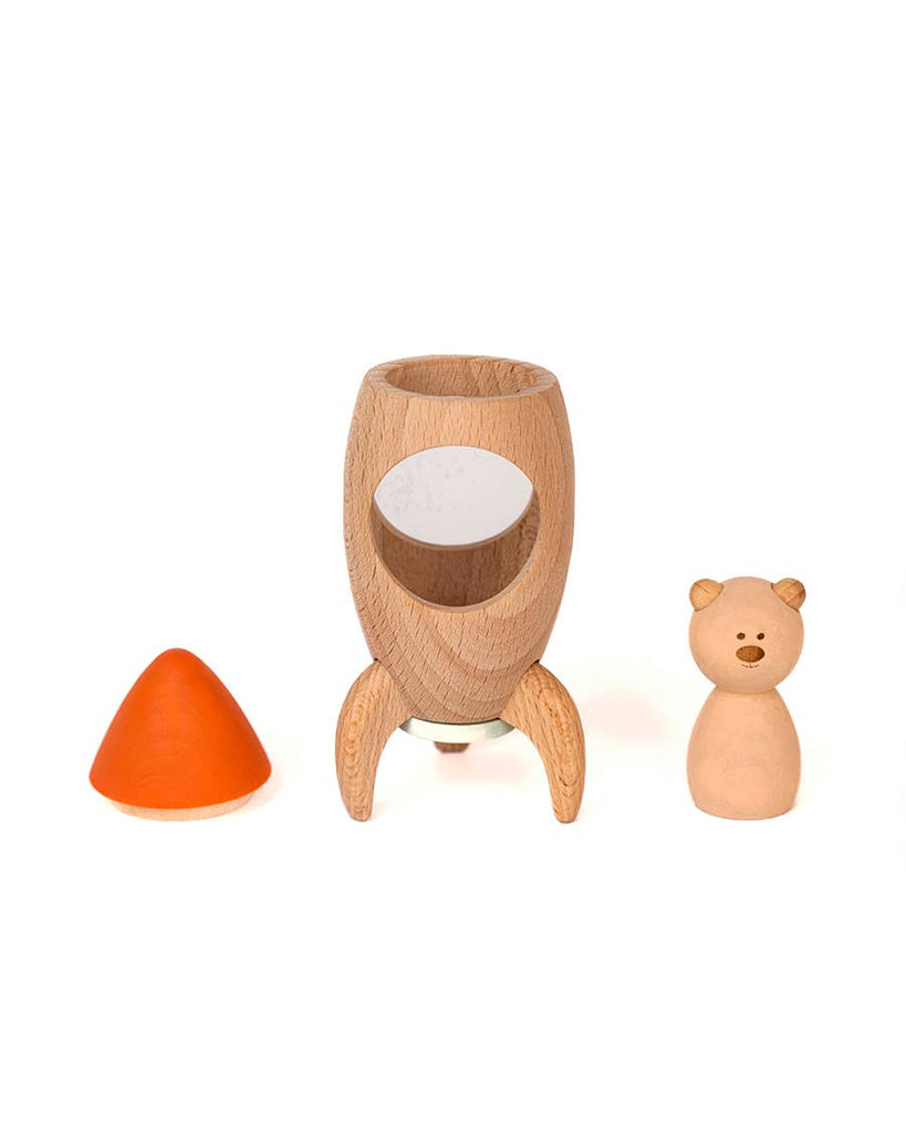 Sabo Concept Rocket with Bear features a removable orange nose cone revealing an open compartment for play. Includes a small wooden bear beside this beautifully crafted natural wood toy.