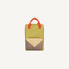 A rectangular kids backpack in Bookworm Green from Sticky Lemon, with red handles, a large front pocket featuring a beige flap and mesh detailing, made from recycled PET bottles, photographed against a plain white background.