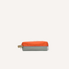 The Sticky Lemon Pencil Case | Color Blocking features a rectangular design in Lifebuoy Orange and Shark Grey with a beige side strap and visible YKK zipper, set against a plain light background.