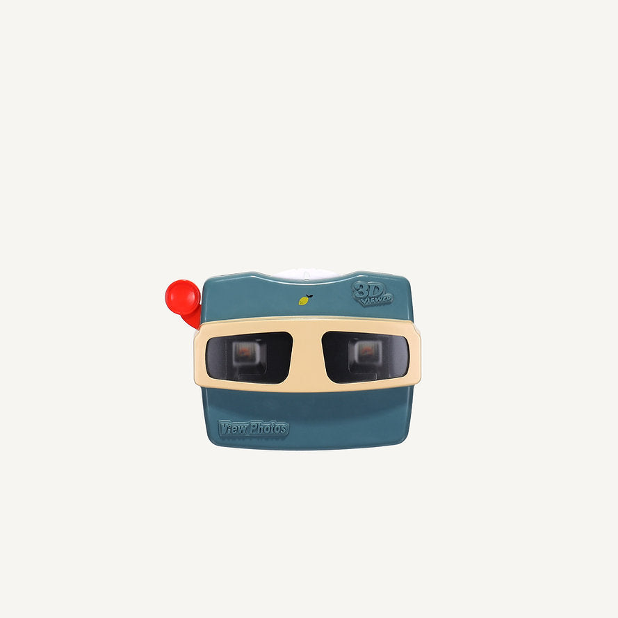 The Sticky Lemon Viewmaster - Wonders of the Deep Sea is a vintage-inspired teal and beige toy with a red lever, designed for viewing 3D image reels of deep sea adventures, shown on a plain white background.